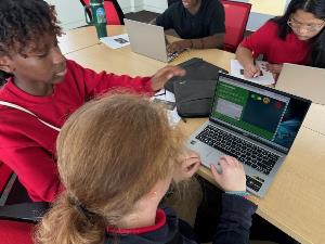 Student Intern helps student with User Interface instructions